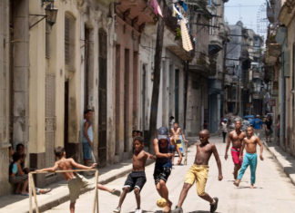 Just Kickin’ It: The Importance of Street Football in Youth Soccer Kids playing street football in Havana.