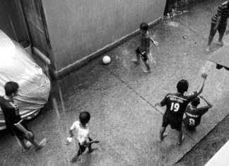 Urban Lens: A Rainy Day in Borneo Indonesia street football